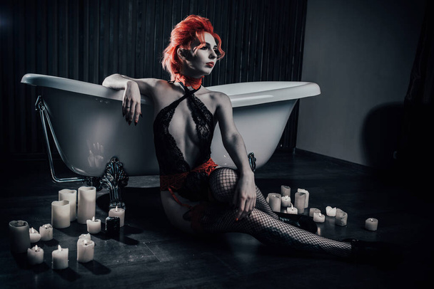 Vampire in underwear in a blood bath - Фото, зображення