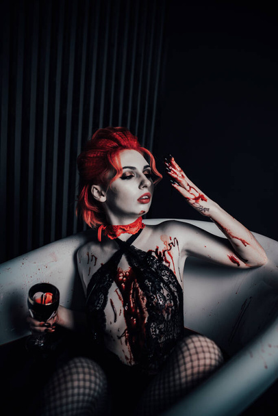 Vampire in underwear in a blood bath - Fotografie, Obrázek