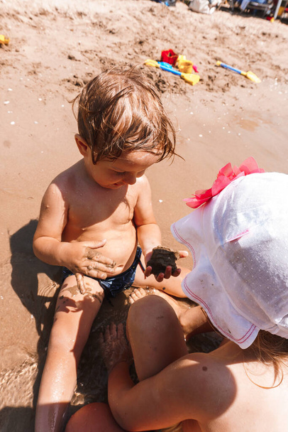 two little kids in the sea - Valokuva, kuva