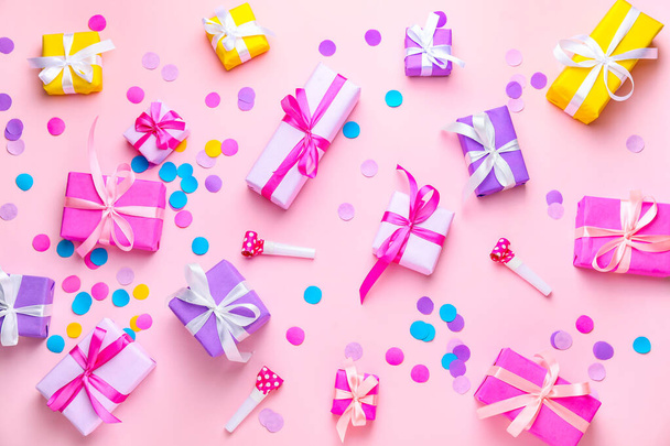 Many Birthday gifts and decor on color background - Photo, Image