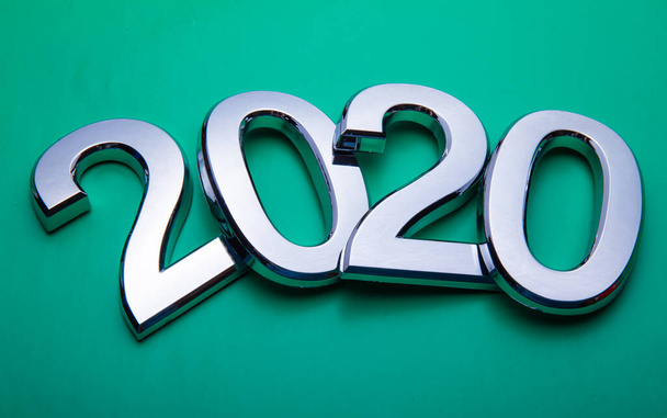 Happy New Year 2020. Symbol from number 2020 on bright background. Silver letters in the form of numbers 2020. - Fotoğraf, Görsel