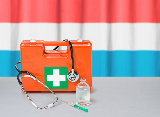First aid kit with stethoscope and syringe - Luxembourg - Photo, Image