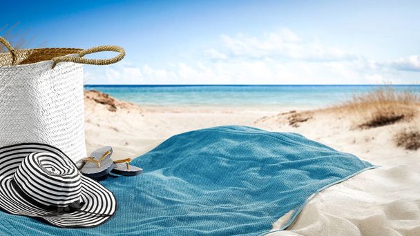 Towel on sunny sandy beach with space for your product and decoration. Hot summer time. - Photo, Image
