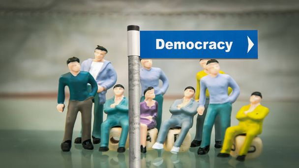 Street Sign the Direction Way to Democracy - 写真・画像