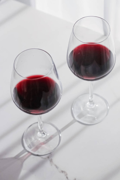 Two crystal glasses of red wine, organic beverage product - Photo, Image