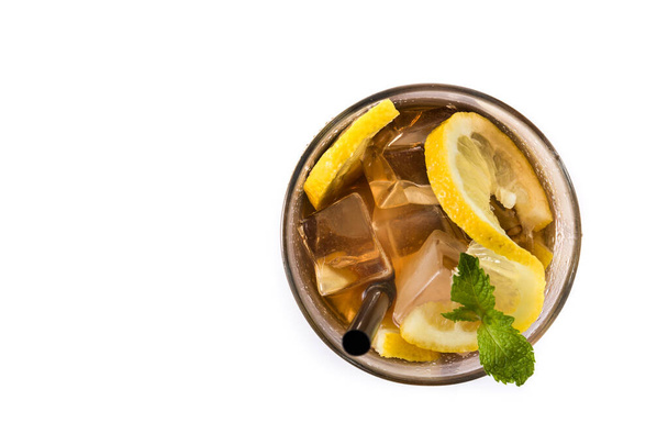 Iced tea drink in glass with lemon isolated on white background. Top view copy space - Photo, Image