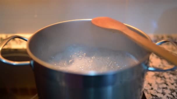 Boiling water in metal pot  - Filmati, video