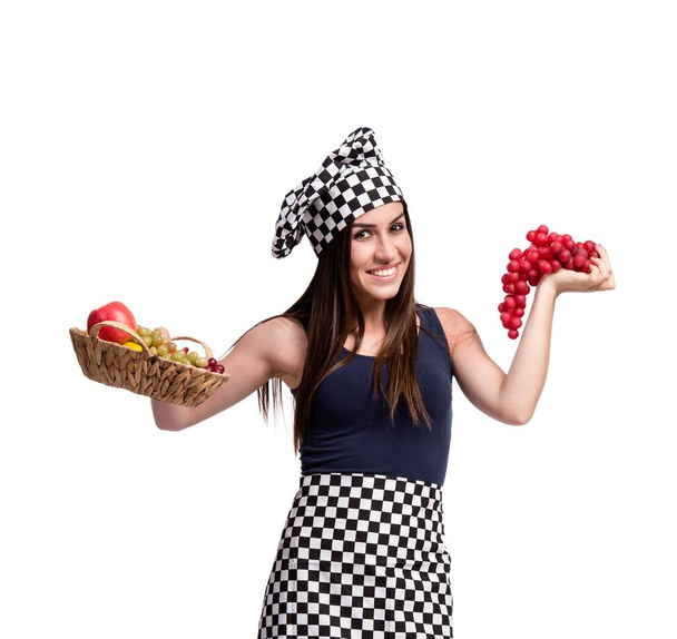 jonge vrouw kok geïsoleerd op witte achtergrond - Foto, afbeelding