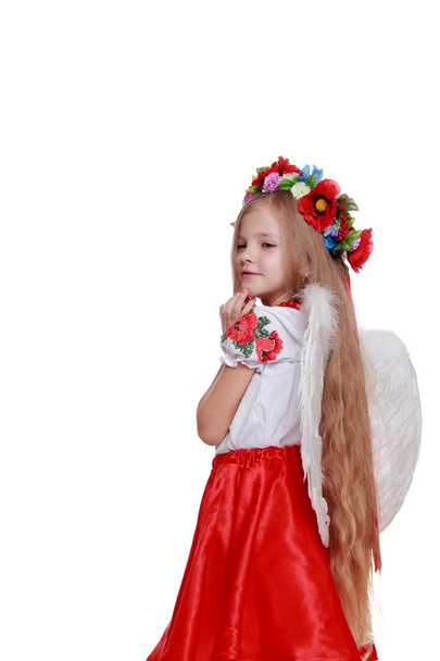 Little angel in a beautiful Ukrainian costume - Fotografie, Obrázek