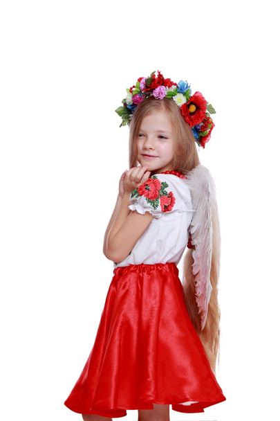 Little angel in a beautiful Ukrainian costume - Photo, image