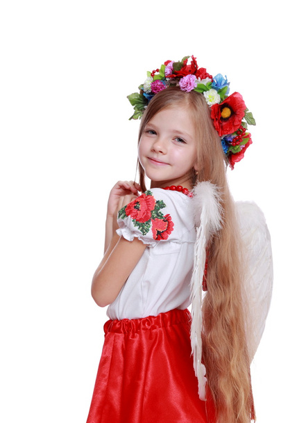 Little angel in a beautiful Ukrainian costume - Φωτογραφία, εικόνα
