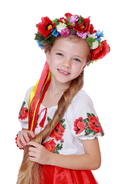 Girl in a Ukrainian national costume - Fotoğraf, Görsel