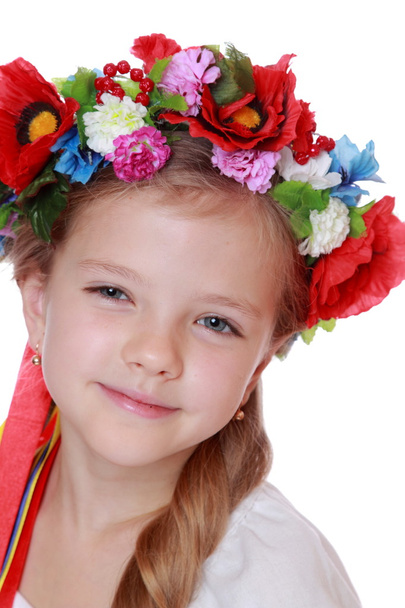 Girl in a Ukrainian national costume - Fotoğraf, Görsel