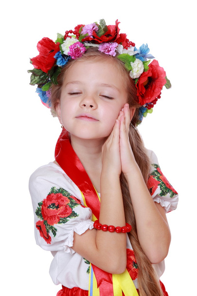 Little girl in a national Ukrainian suit - Фото, изображение