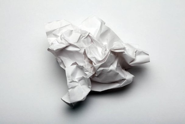 Crumpled sheet of paper. Trash concept. - 写真・画像