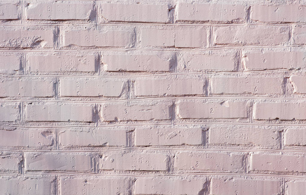 Açık pembe renge boyanmış tuğla duvar. Doku. - Fotoğraf, Görsel
