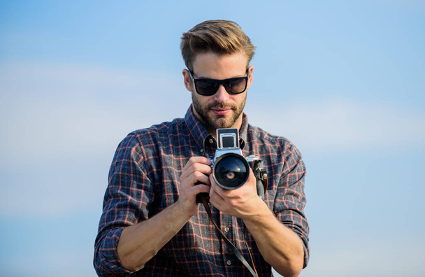 Flawless Moment. macho man with camera. photographer in glasses. travel with camera. male fashion style. looking trendy. sexy man touristic reporter. capture adventure. journalist - Φωτογραφία, εικόνα