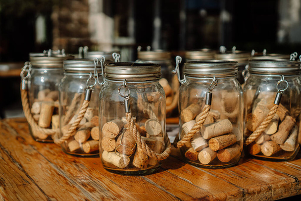 Decorative jars filled with wine corks. Subject photo. - Photo, Image