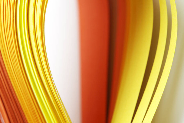 Abstract Yellow and red color wave curl strip paper.  Background for prints, posters, cards. - Fotografie, Obrázek
