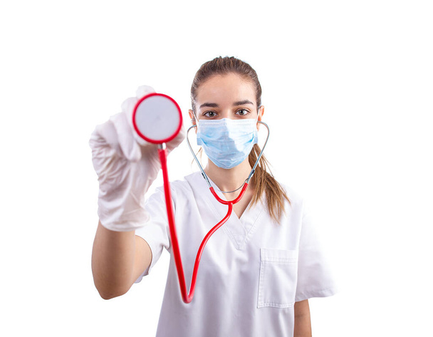 Young female doctor holding a stethoscope - Фото, зображення