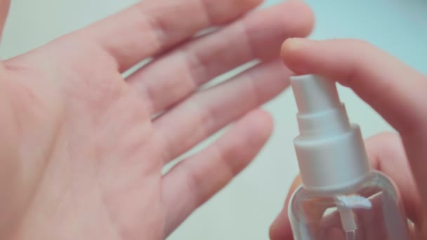 Man spray hands sanitizer, disinfection, bacteria, virus protection. - Filmati, video
