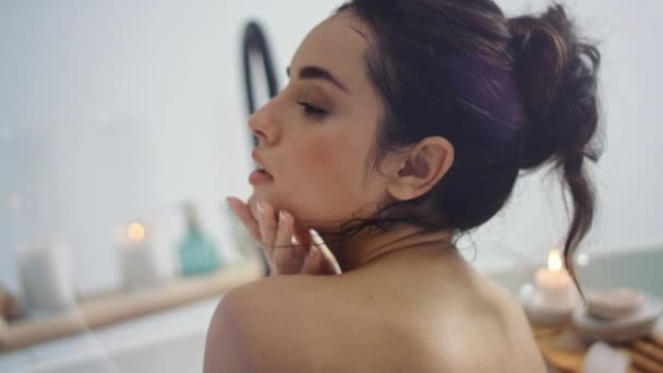 Sexy woman touching skin in luxury bath. Romantic girl touching skin at bathtub - Filmati, video