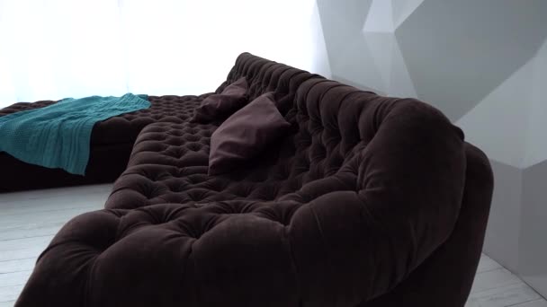 modern living room with decorative pillow on sofa - Footage, Video