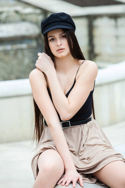Beautiful young woman with clean perfect skin. Young Russian woman with clean fresh skin. Girl beauty face care. Fashion Portrait of Stylish Pretty Brunette. Sensual girl. - Valokuva, kuva