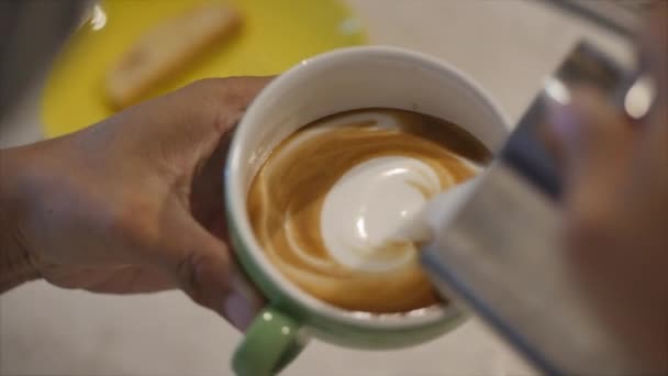 Barista Drawing Latte Art on Coffee with Soy Milk. Process of Making Vegan Lactose Free Drink in Coffeeshop. Professional barista. - Πλάνα, βίντεο