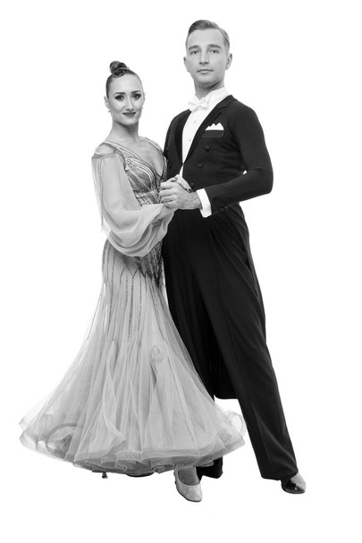 ballrom dance couple in a dance pose isolated on black background - Φωτογραφία, εικόνα