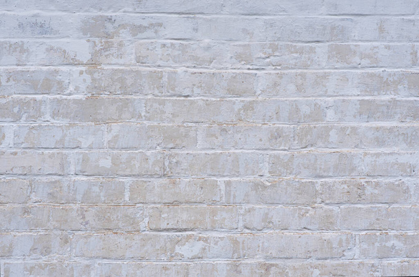 White weathered wall, peeling wall, made of silicate brick. Texture. - Φωτογραφία, εικόνα