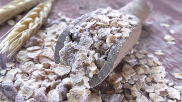 Oat flakes in Wooden table, close up  - Footage, Video