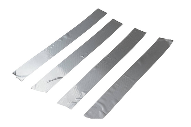 Silver scotch tape pieces isolated on white background. Top view. - Photo, Image