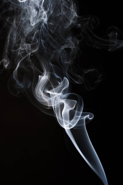 Abstract smoke on black background for designs. - Photo, Image
