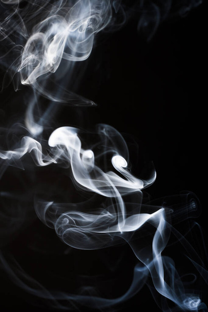 Abstract smoke on black background for designs. - Zdjęcie, obraz