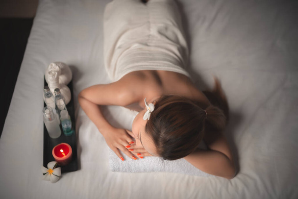 Asians beautiful woman relaxing during massage at spa - Fotografie, Obrázek