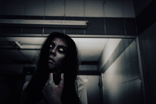 Portrait of asian woman make up ghost face, Horror scene, Scary background, Halloween poster  - Valokuva, kuva
