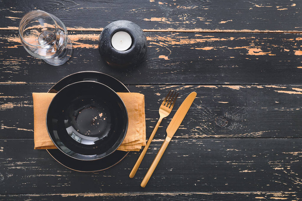 Beautiful table setting on dark wooden background - Foto, afbeelding