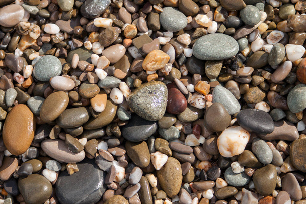 Zee pebble stenen achtergrond strand rotsen - Foto, afbeelding