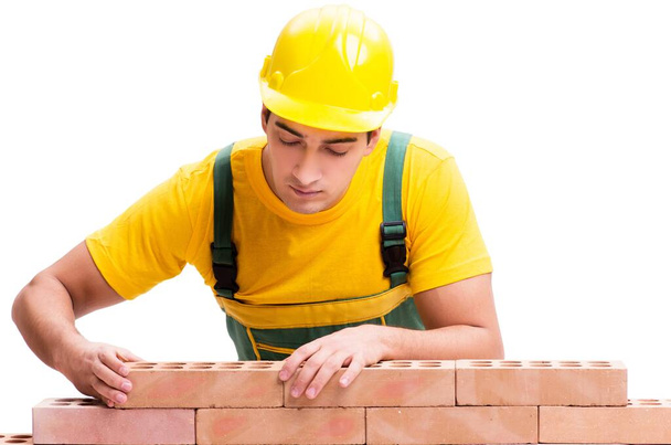 Hermoso trabajador de la construcción edificio pared de ladrillo
 - Foto, Imagen