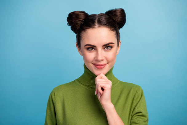 Closeup photo of attractive cute lady look sly eyes think creative idea arm on chin cunning smiling wear warm green turtleneck pullover isolated blue color background - Foto, Bild