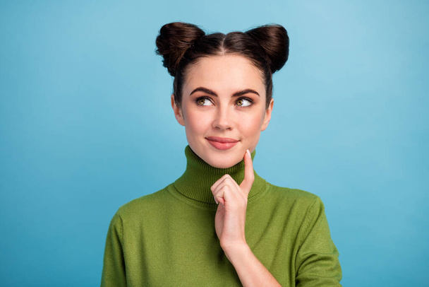 Closeup photo of pretty cute lady look side up empty space think creative idea arm on chin dreamer wear warm green turtleneck pullover isolated blue color background - Foto, Imagem