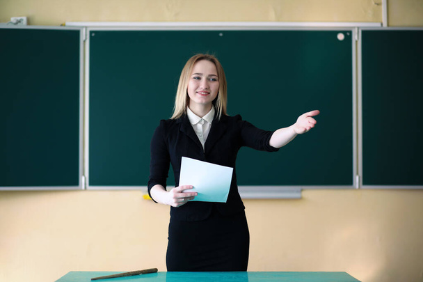 Young teacher in the school room during clas - Fotografie, Obrázek