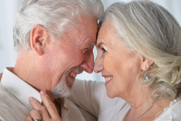  senior couple hugging at home  - Φωτογραφία, εικόνα