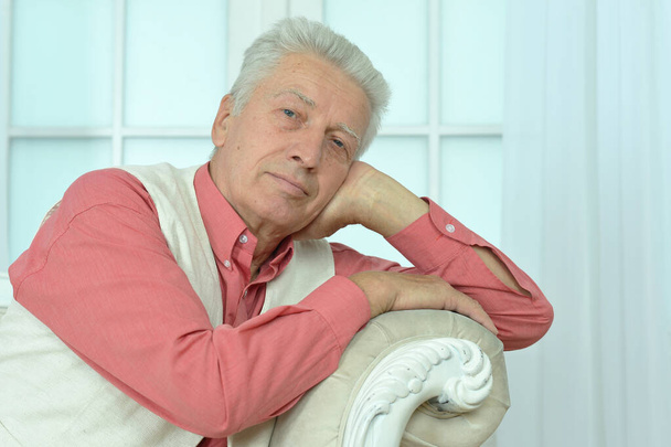 Close up portrait of thoughtful senior man at home - Zdjęcie, obraz