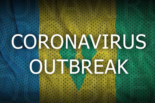 Svatý Vincenc a vlajka Grenadin a nápis ohniska koronaviru. Covid-19 nebo 2019-ncov virus koncept - Fotografie, Obrázek