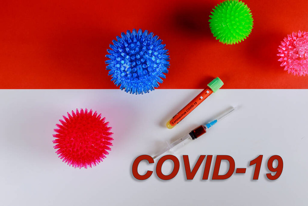 Παγκόσμια πανδημία μολυσμένου με σωλήνα αίματος με παγκόσμια λοίμωξη από τον ιό της στέψης με τον ιό της στέψης Covid 19 - Φωτογραφία, εικόνα