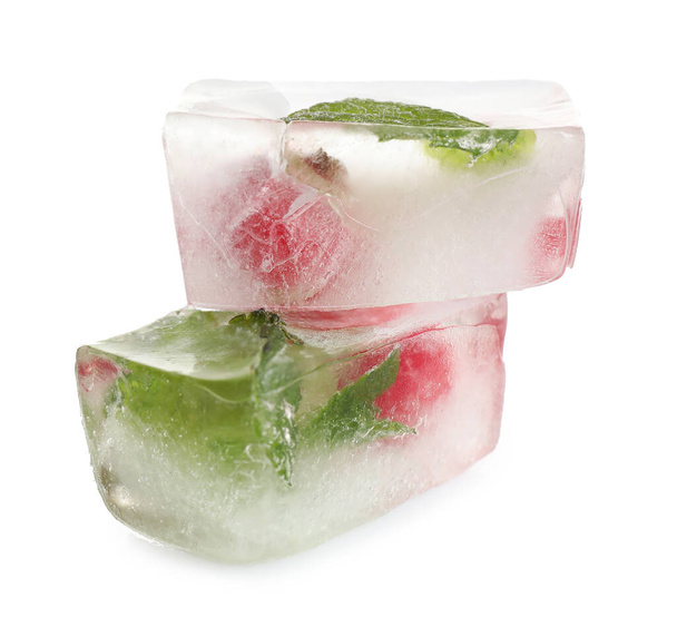 Ice cubes with currant and mint on white background - Foto, imagen