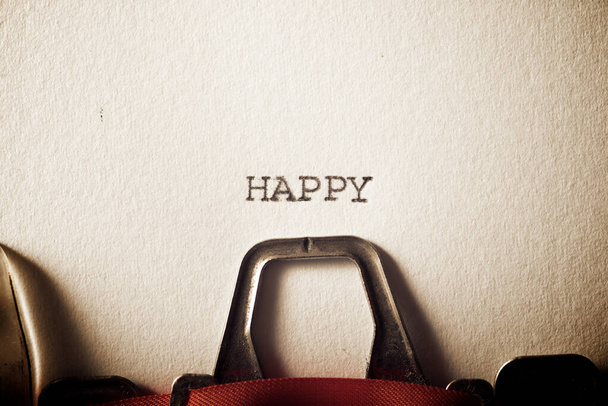 Le mot Happy écrit avec une machine à écrire
. - Photo, image