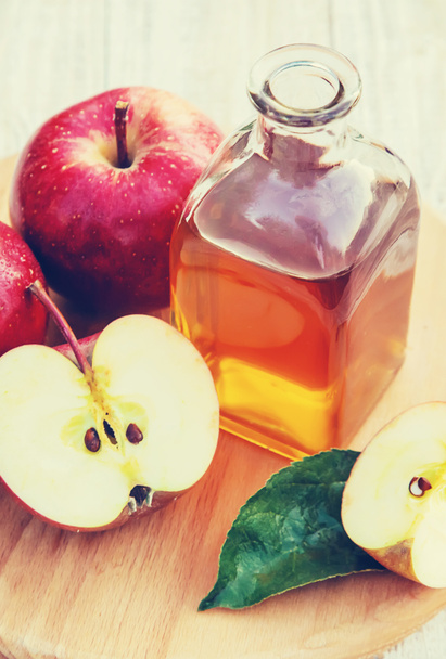 Apple cider vinegar in a bottle. Selective focus. nature. - Photo, image
